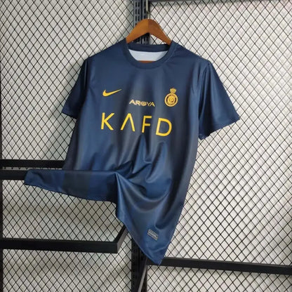 Al Nassr 23/24 Away Jersey - Close-up of FUTBOLSPLY crest and jersey details