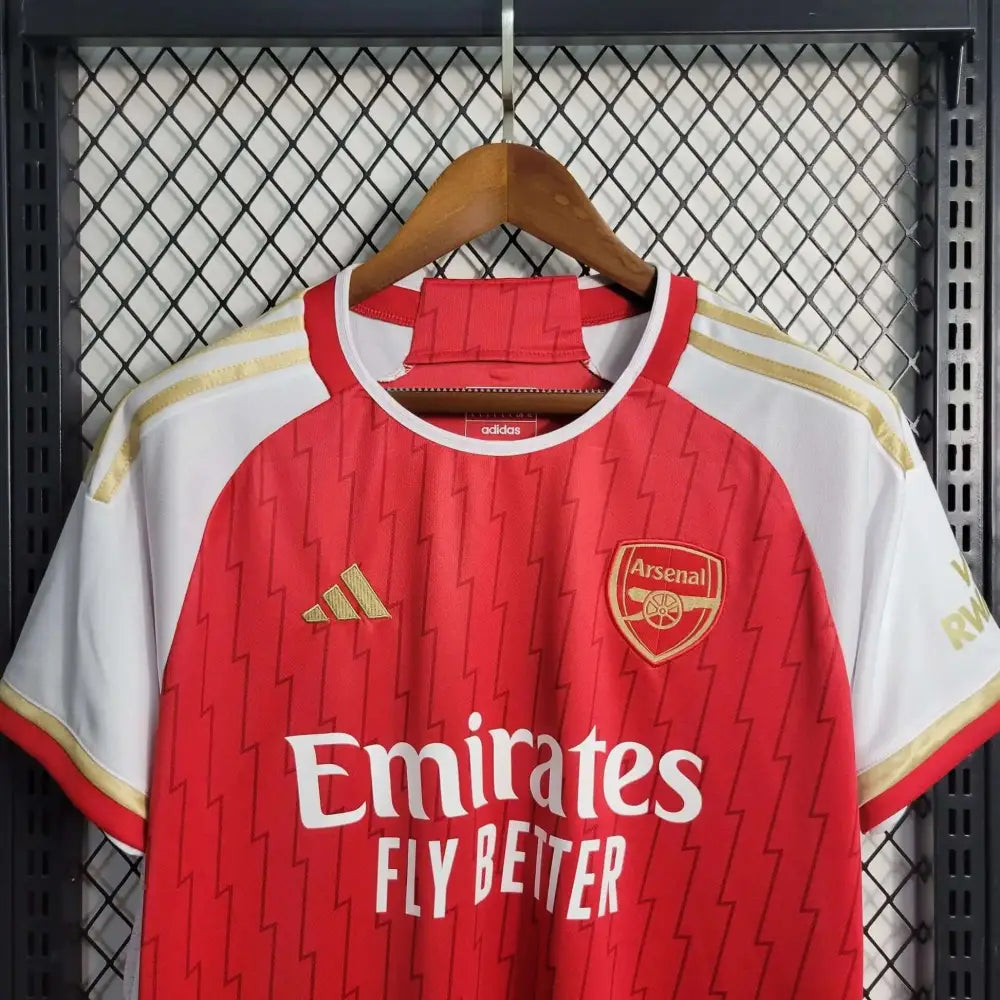Arsenal 23/24 Home Jersey - Close-up of Arsenal crest and jersey details