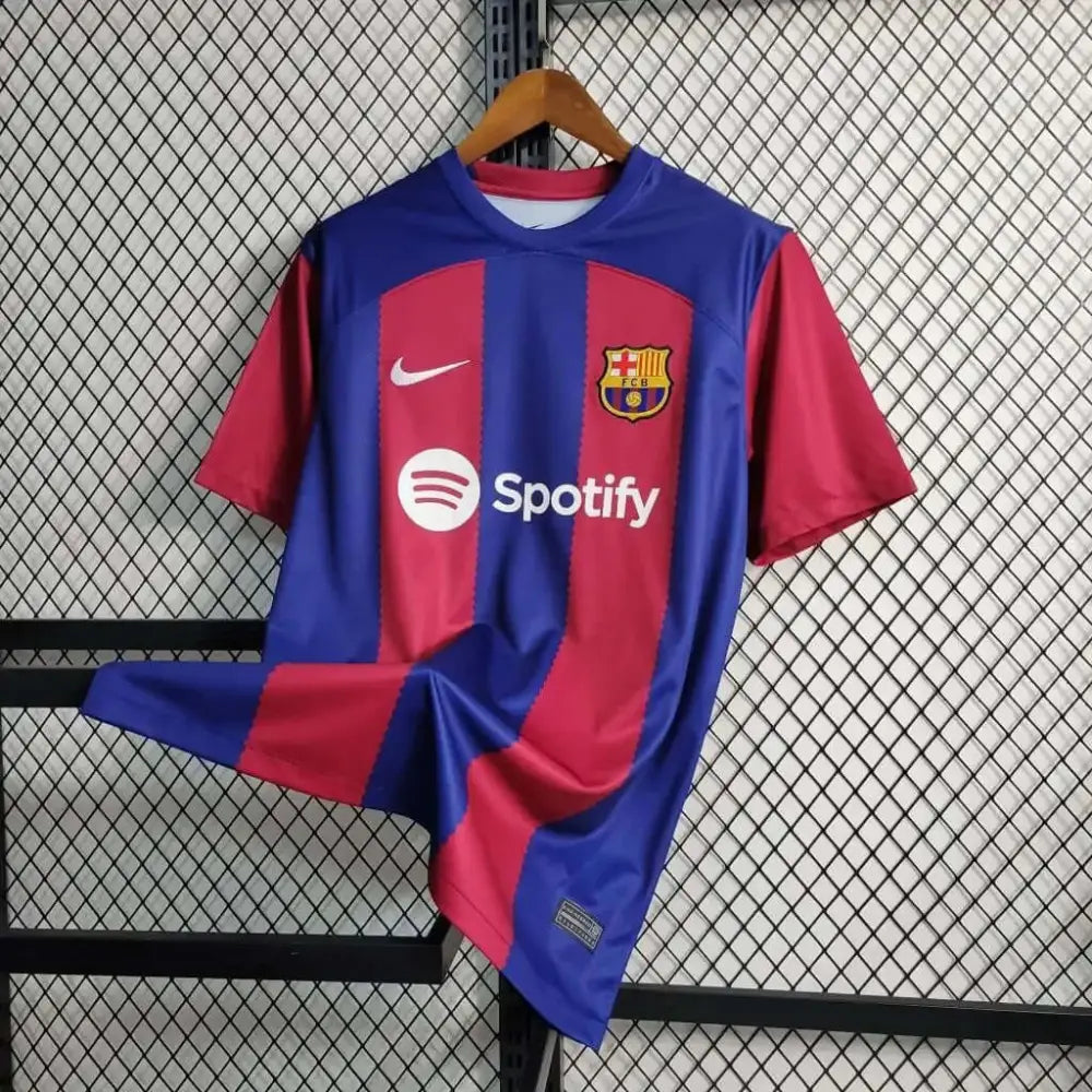 Barcelona 23/24 Home Jersey - Close-up of Barcelona crest and jersey details