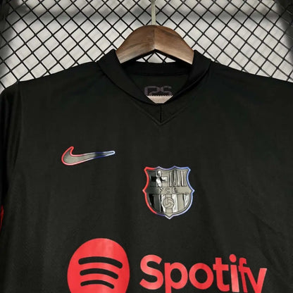 Barcelona 24/25 Away Jersey - Close-up of Barcelona crest and jersey details