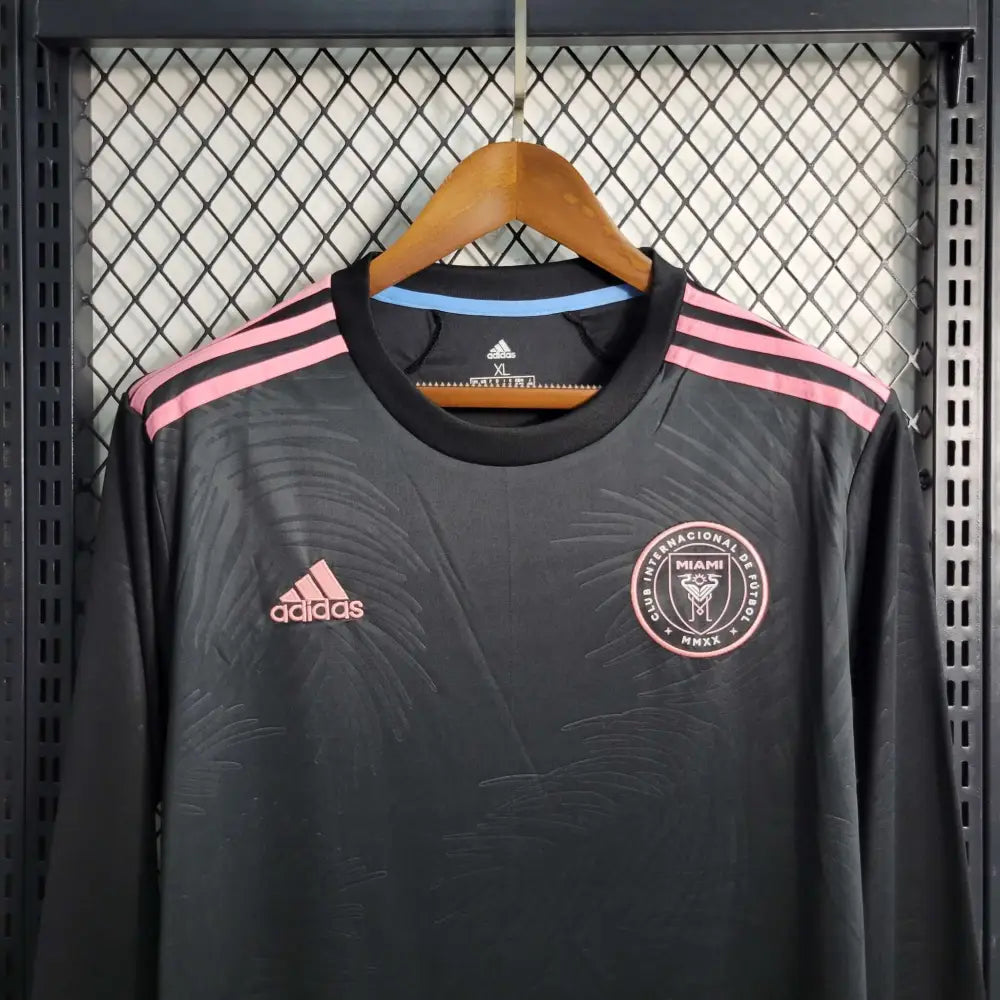 Inter Miami 22/23 Away Black Long Sleeve Jersey - Messi Team Kit | MLS Soccer Shirt - Close-up of FUTBOLSPLY crest and jersey details