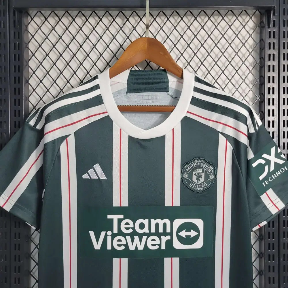 Manchester United 23/24 Away Jersey - Close-up of Manchester United crest and jersey details
