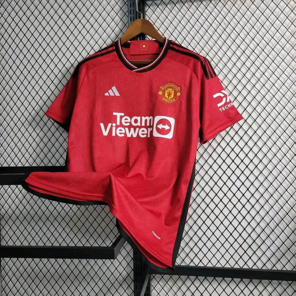 Manchester United 23/24 Home Jersey - Close-up of Manchester United crest and jersey details