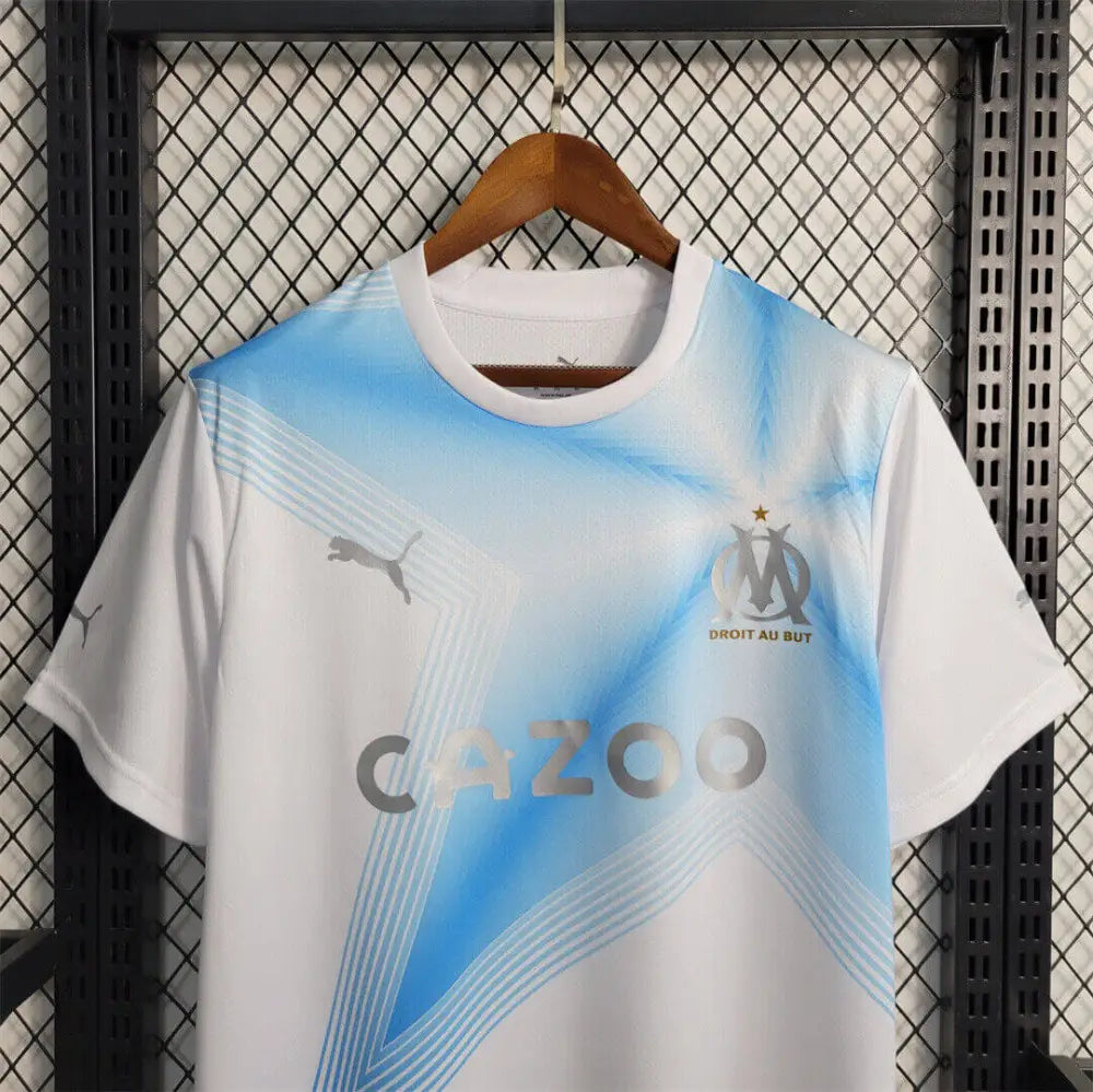 Marseille 23/24 Home Jersey - Close-up of FUTBOLSPLY crest and jersey details