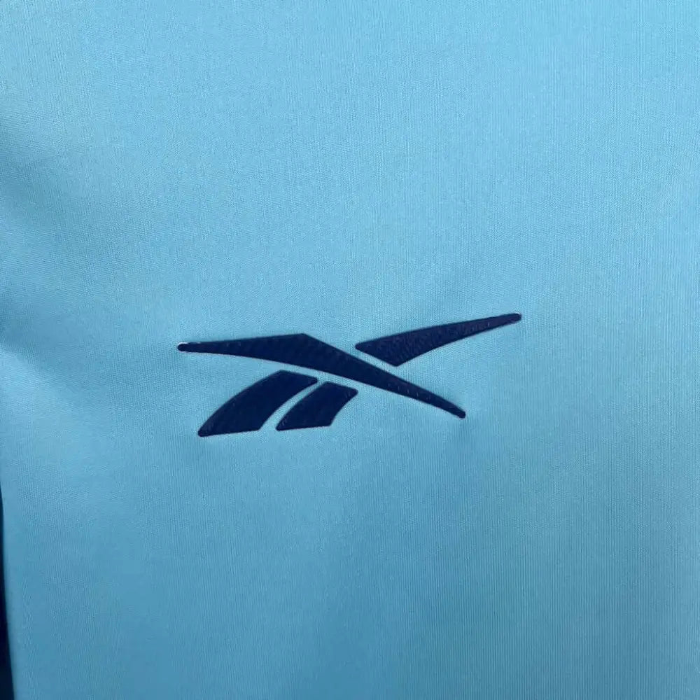 Panama 25/26 Away Shirt - Close-up of FUTBOLSPLY crest and jersey details