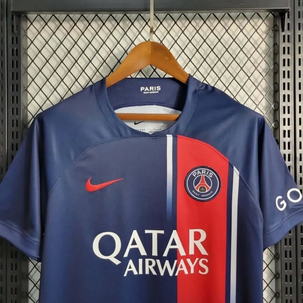 PSG 23/24 Home Jersey - Close-up of PSG crest and jersey details