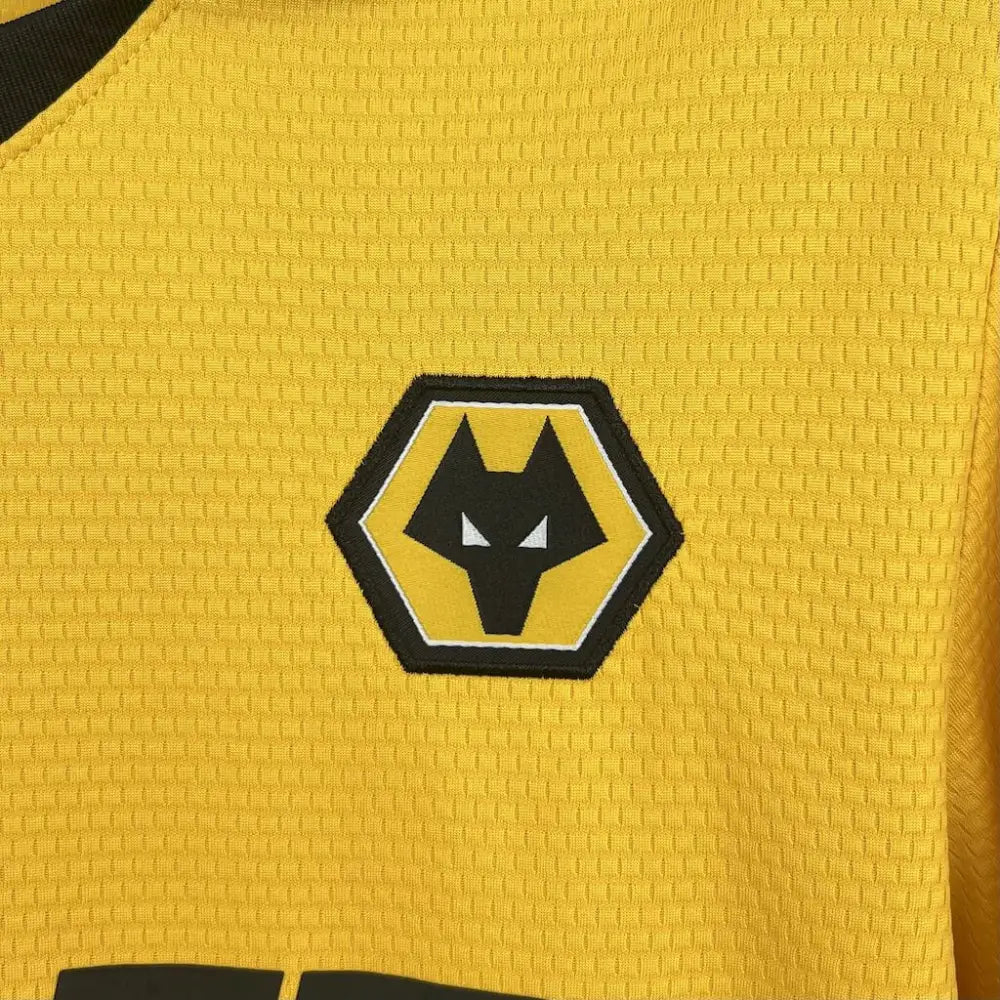 Wolves 25/26 Home Shirt - Close-up of FUTBOLSPLY crest and jersey details
